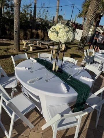 Outdoor wedding table with palm trees